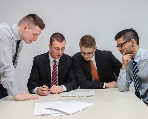 Club manager and club board members at the table